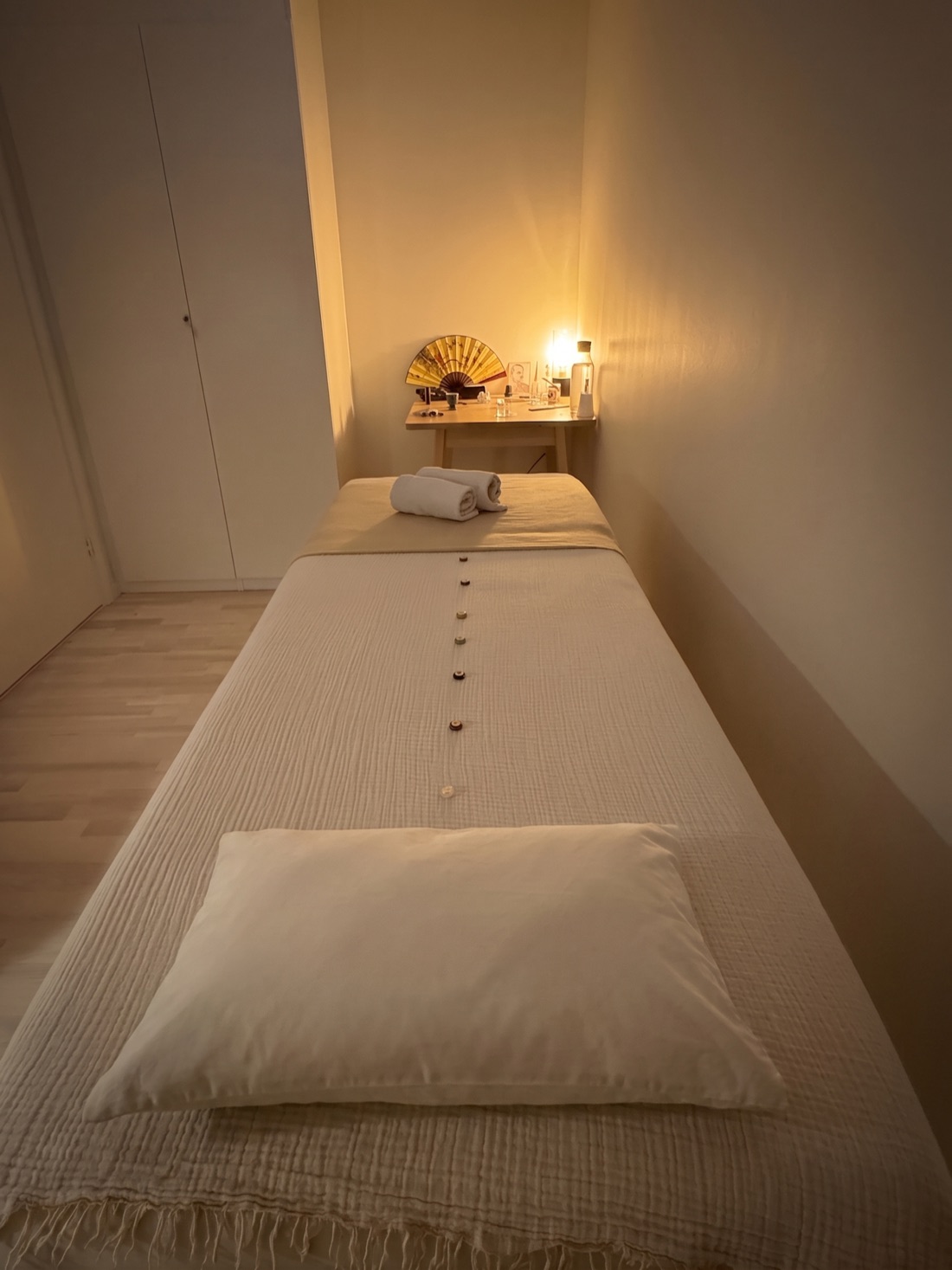 The calm, softly lit treatment room seen from above
